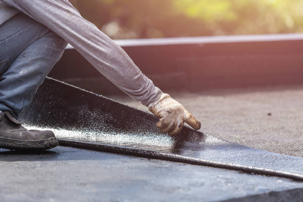 Professional Waterproofing technician working in Winfield, AL